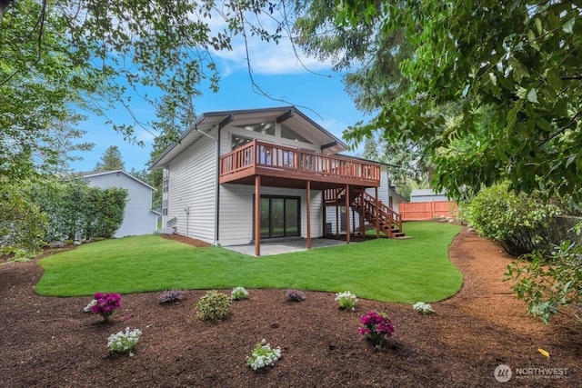 12816 130th Ct NE, Kirkland, WA 98034 - rear view of property featuring a wooden deck, stairway, and a patio