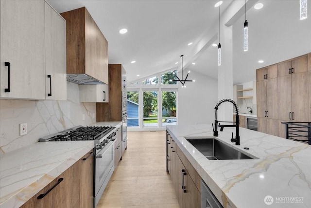 12816 130th Ct NE, Kirkland, WA 98034 - kitchen featuring a sink, stainless steel appliances, light stone countertops, lofted ceiling, and tasteful backsplash