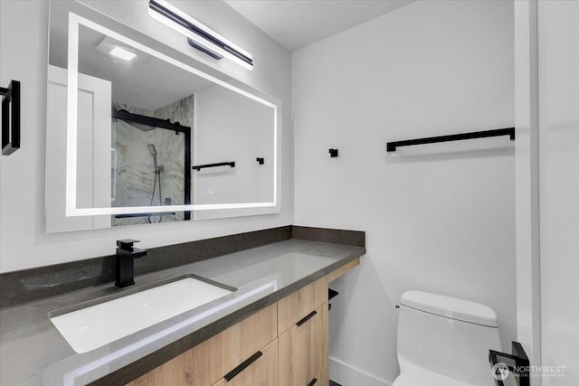 12816 130th Ct NE, Kirkland, WA 98034 - full bathroom featuring a marble finish shower, vanity, and toilet