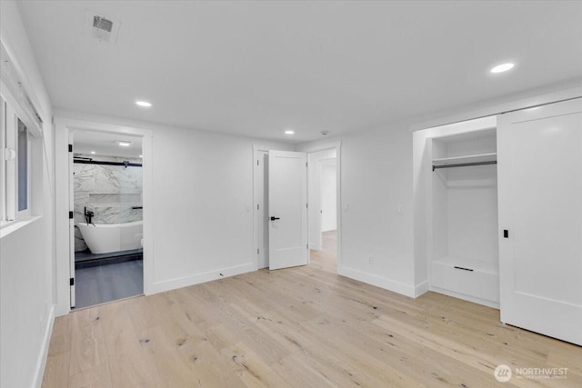 12816 130th Ct NE, Kirkland, WA 98034 - unfurnished bedroom featuring recessed lighting, wood finished floors, ensuite bathroom, and baseboards