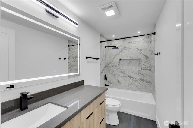 12816 130th Ct NE, Kirkland, WA 98034 - bathroom with vanity, toilet, a combined bath / shower with marble appearance, and recessed lighting