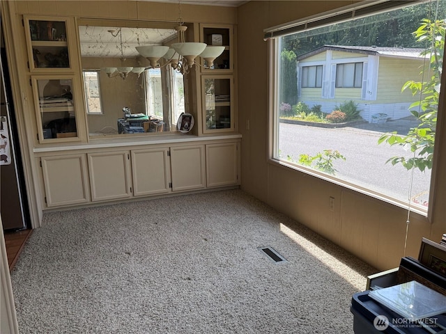 1415 84th St SE Unit 196, Everett, WA 98208 - unfurnished dining area with light colored carpet