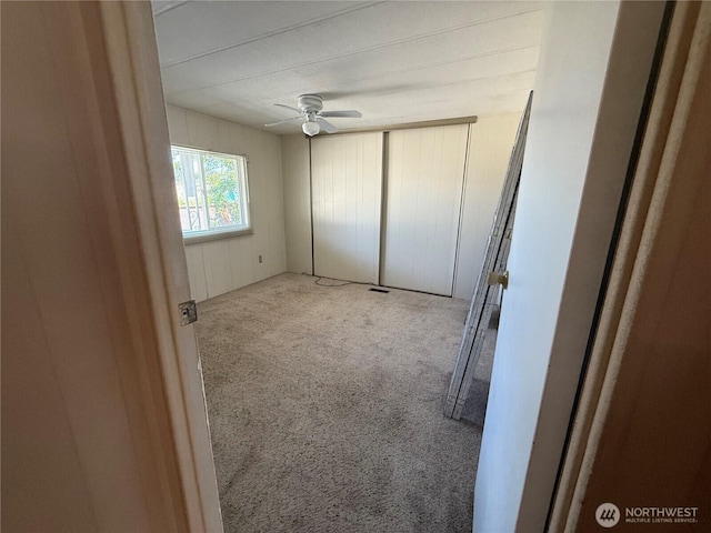 1415 84th St SE Unit 196, Everett, WA 98208 - unfurnished bedroom with carpet floors and a ceiling fan