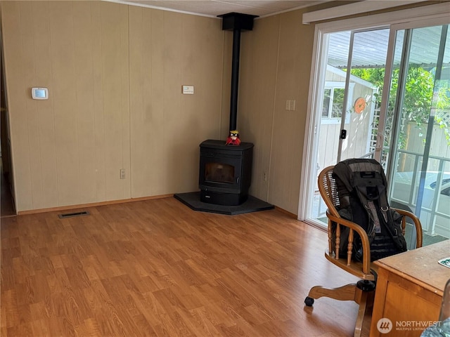 1415 84th St SE Unit 196, Everett, WA 98208 - office with light wood finished floors and a wood stove