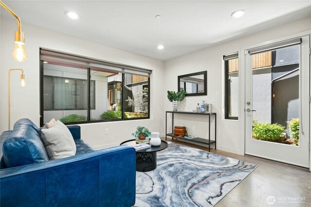 3219 California Ave SW Unit B, Seattle, WA 98116 - living room with plenty of natural light, concrete flooring, and recessed lighting
