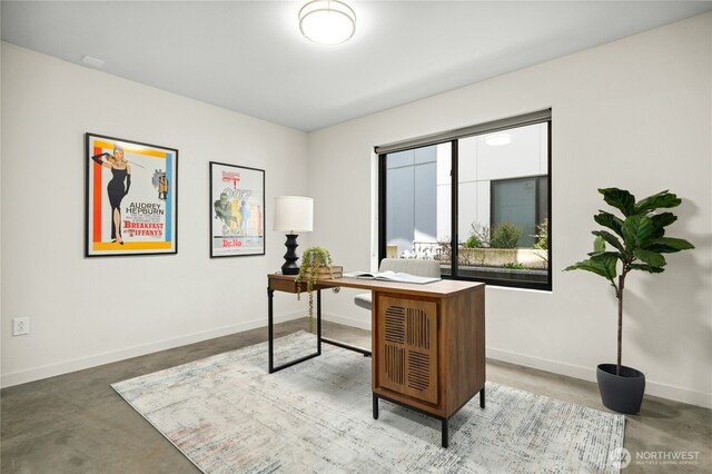 3219 California Ave SW Unit B, Seattle, WA 98116 - office area with finished concrete flooring and baseboards