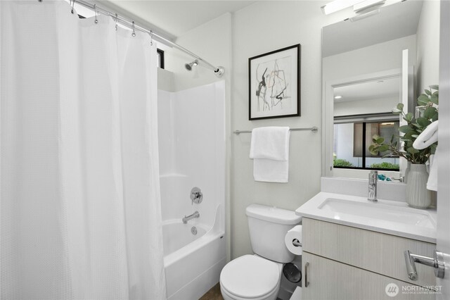 3219 California Ave SW Unit B, Seattle, WA 98116 - bathroom featuring shower / bath combo with shower curtain, toilet, and vanity