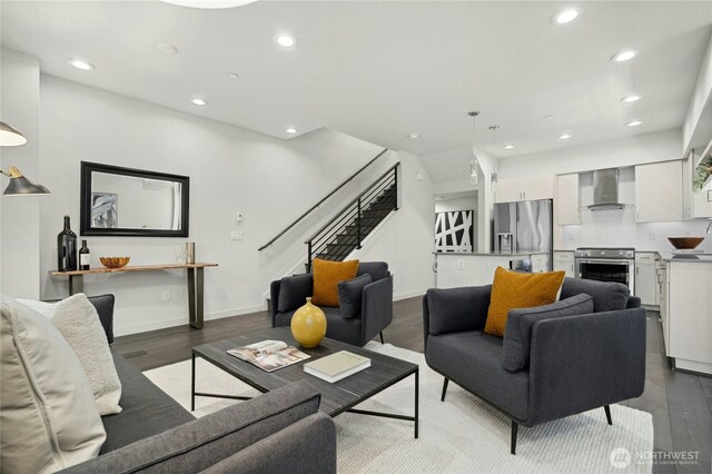 3219 California Ave SW Unit B, Seattle, WA 98116 - living room featuring stairs, dark wood-type flooring, recessed lighting, and baseboards