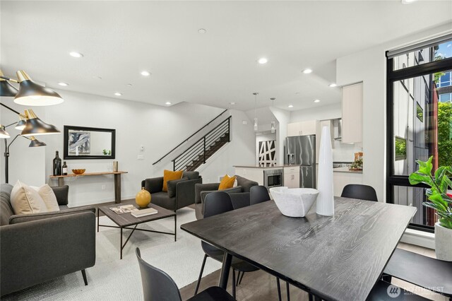 3219 California Ave SW Unit B, Seattle, WA 98116 - dining space featuring stairway and recessed lighting