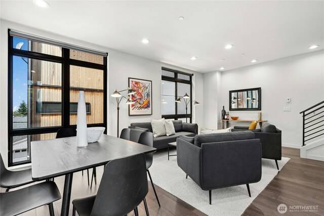 3219 California Ave SW Unit B, Seattle, WA 98116 - living area featuring stairs, recessed lighting, healthy amount of natural light, wood finished floors, and baseboards