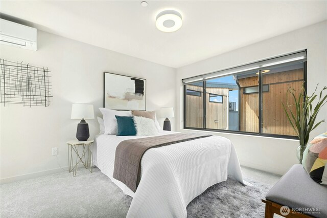 3219 California Ave SW Unit B, Seattle, WA 98116 - bedroom with a wall mounted air conditioner, carpet flooring, and baseboards