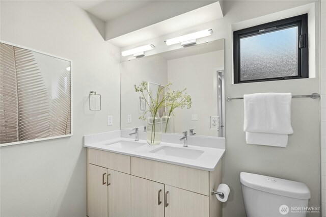 3219 California Ave SW Unit B, Seattle, WA 98116 - bathroom featuring double vanity and toilet