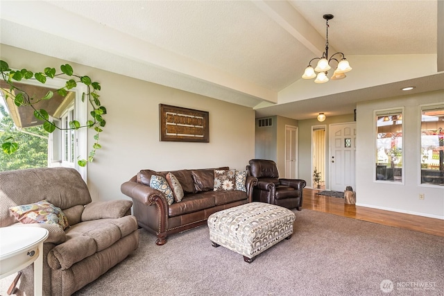 405 E Wiser Lake Rd, Lynden, WA 98264 - living area with carpet flooring, a chandelier, wood finished floors, and baseboards