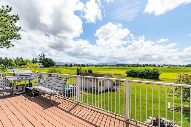 405 E Wiser Lake Rd, Lynden, WA 98264 - wooden deck with a grill, a yard, and a view of countryside