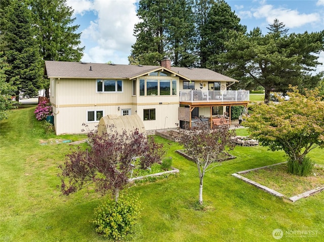 405 E Wiser Lake Rd, Lynden, WA 98264 - rear view of property with a wooden deck, a lawn, a chimney, and a patio area
