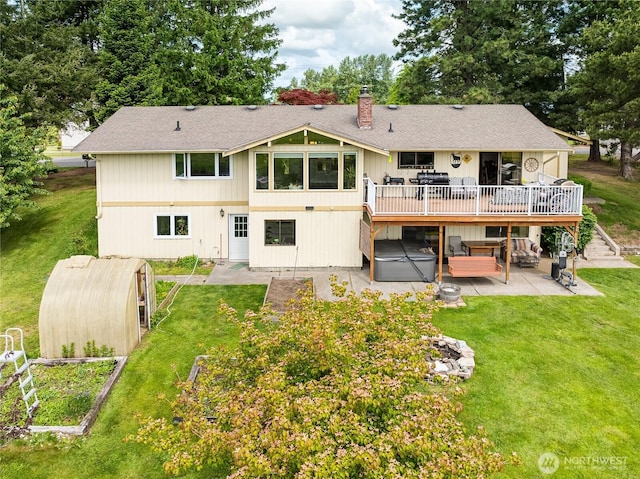 405 E Wiser Lake Rd, Lynden, WA 98264 - rear view of property with a hot tub, a patio area, a wooden deck, and a yard