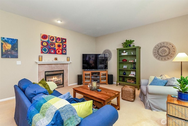 7623 152nd St SE, Snohomish, WA 98296 - living room featuring carpet flooring, a tiled fireplace, and baseboards