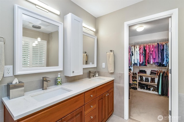 7623 152nd St SE, Snohomish, WA 98296 - bathroom with double vanity and a walk in closet