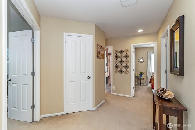 7623 152nd St SE, Snohomish, WA 98296 - hall featuring light carpet, baseboards, and recessed lighting