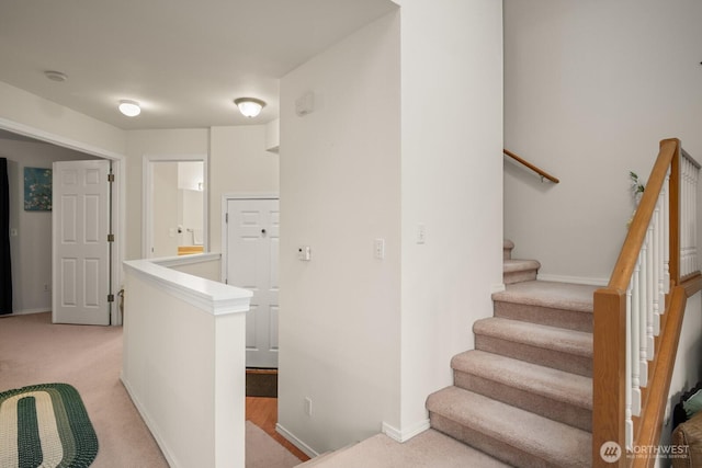 8828 238th St SW Unit D-1, Edmonds, WA 98026 - hall with light carpet and an upstairs landing