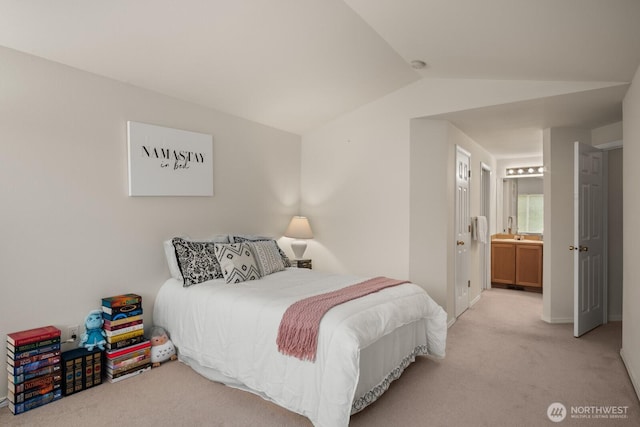8828 238th St SW Unit D-1, Edmonds, WA 98026 - bedroom featuring light carpet, lofted ceiling, and ensuite bath