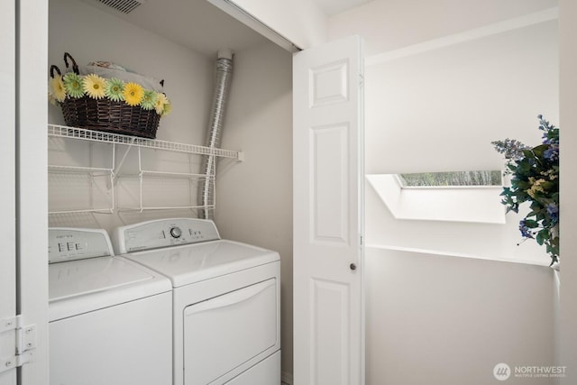 8828 238th St SW Unit D-1, Edmonds, WA 98026 - laundry area with a skylight and washer and dryer