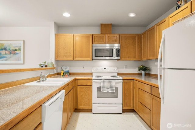 8828 238th St SW Unit D-1, Edmonds, WA 98026 - kitchen featuring white appliances, light floors, and recessed lighting