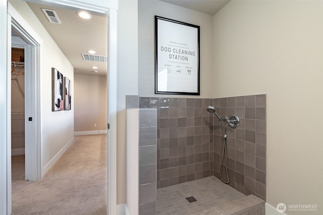 14524 204th Ave E Unit 893, Bonney Lake, WA 98391 - full bathroom with tiled shower, baseboards, recessed lighting, and a spacious closet