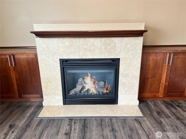10027 SE Dotson St SE, Yelm, WA 98597 - detailed view of wood finished floors and a tile fireplace