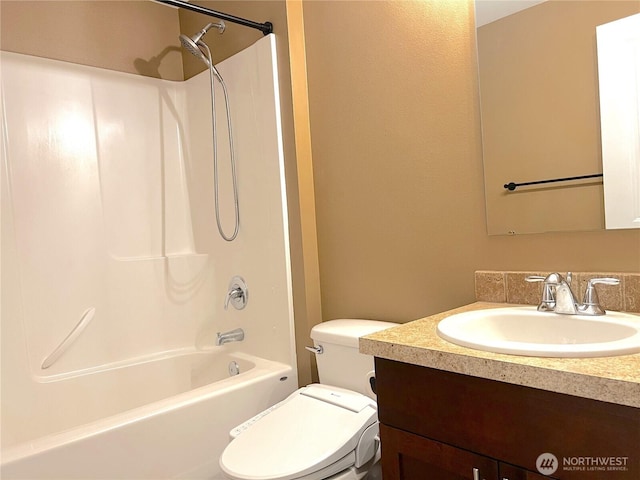 10027 SE Dotson St SE, Yelm, WA 98597 - bathroom featuring vanity, toilet, and shower / bath combination