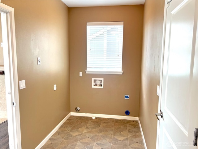10027 SE Dotson St SE, Yelm, WA 98597 - laundry area with electric dryer hookup, hookup for a washing machine, and baseboards