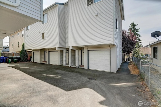 536ST N 103rd Unit A, Seattle, WA 98133 - garage featuring driveway