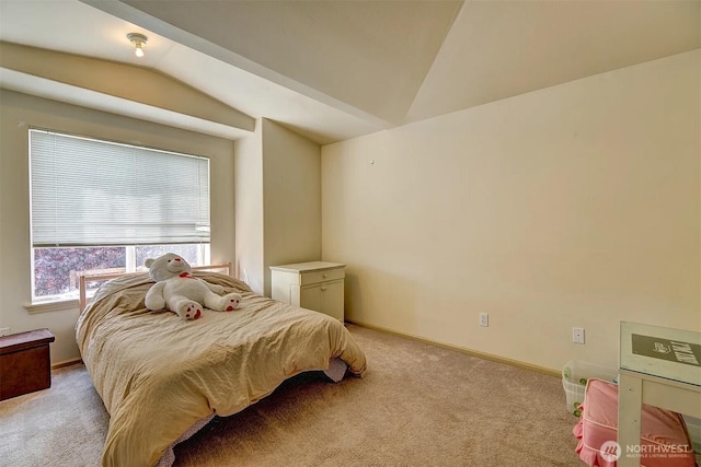 536ST N 103rd Unit A, Seattle, WA 98133 - bedroom with vaulted ceiling, light colored carpet, and baseboards