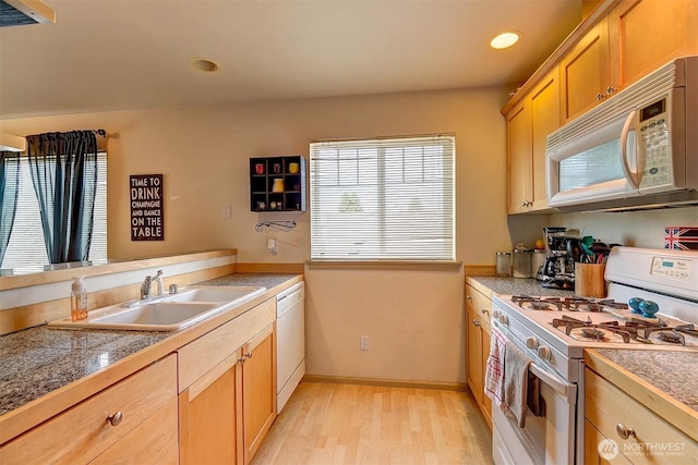 536ST N 103rd Unit A, Seattle, WA 98133 - kitchen featuring white appliances, a sink, tile counters, light wood finished floors, and recessed lighting
