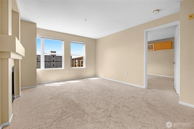 4343 Roosevelt Way NE Unit 401, Seattle, WA 98105 - unfurnished living room with carpet and a fireplace