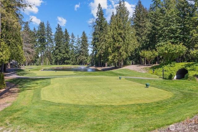 15512 Country Club Dr Unit B25, Mill Creek, WA 98012 - view of property's community featuring a water view, view of wooded area, a lawn, and view of golf course