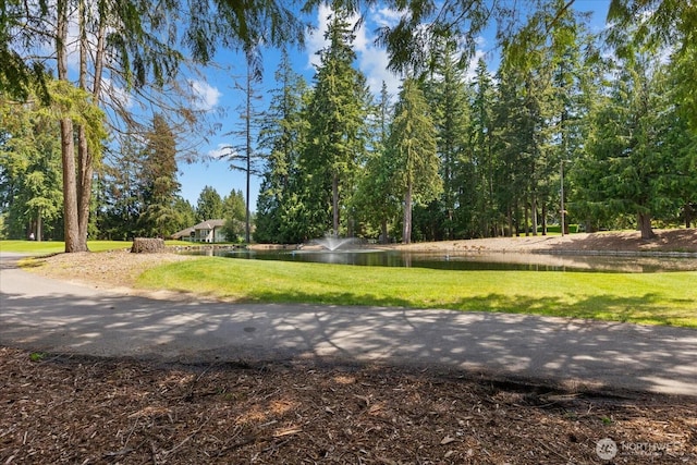 15512 Country Club Dr Unit B25, Mill Creek, WA 98012 - view of property's community featuring a water view and a yard