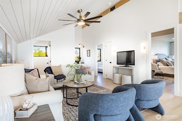 4489 Sucia Dr, Ferndale, WA 98248 - living area with light wood-style flooring, a ceiling fan, and high vaulted ceiling