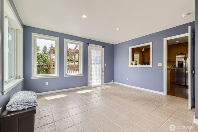 12019B 25th Ave NE, Seattle, WA 98125 - foyer entrance featuring light tile patterned floors, baseboards, and recessed lighting