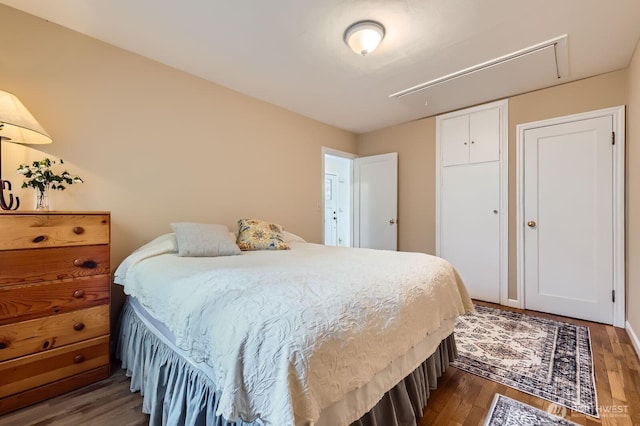 12019B 25th Ave NE, Seattle, WA 98125 - bedroom featuring attic access and wood finished floors