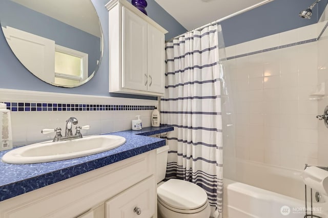 12019B 25th Ave NE, Seattle, WA 98125 - full bathroom with shower / tub combo with curtain, toilet, vanity, and decorative backsplash