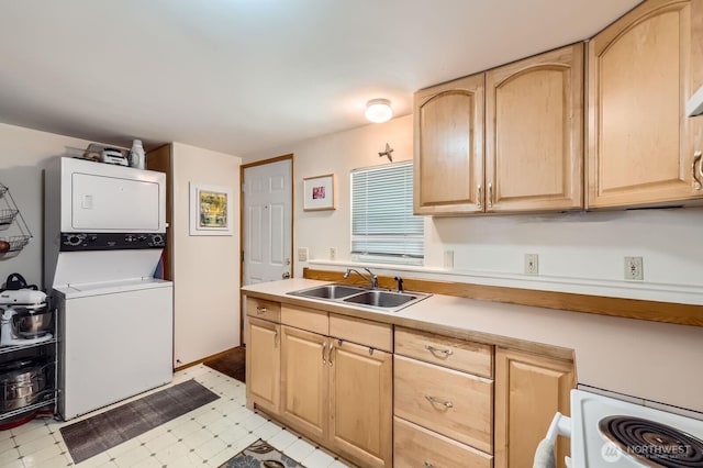 12019B 25th Ave NE, Seattle, WA 98125 - kitchen with light brown cabinets, a sink, stacked washer / drying machine, light countertops, and light flooring