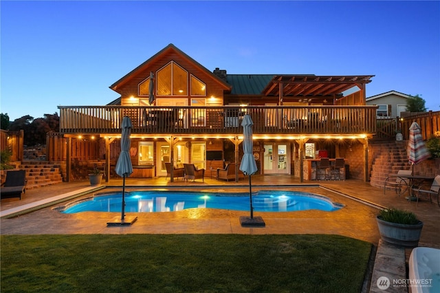 418 Summer Pl SW, Mattawa, WA 99349 - back of property with a wooden deck, a patio, and an outdoor pool