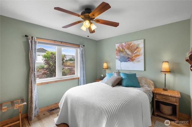 418 Summer Pl SW, Mattawa, WA 99349 - bedroom featuring wood finished floors, baseboards, and a ceiling fan
