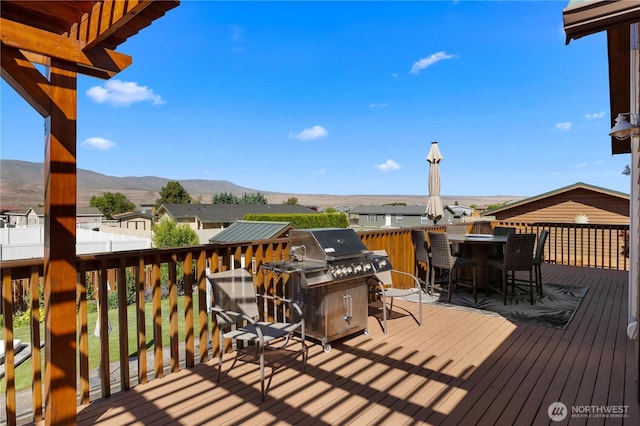 418 Summer Pl SW, Mattawa, WA 99349 - wooden terrace with a mountain view and area for grilling