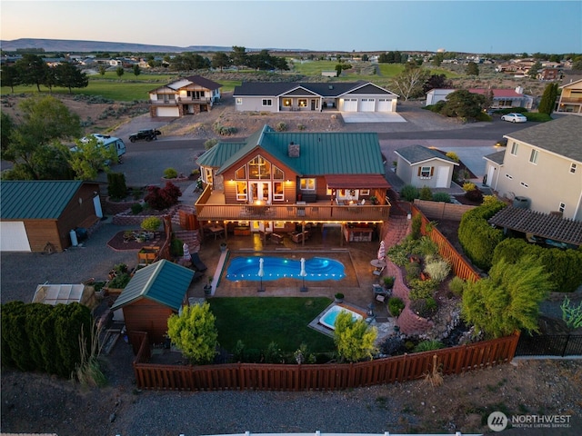 418 Summer Pl SW, Mattawa, WA 99349 - aerial view at dusk of view of pool area and a residential view
