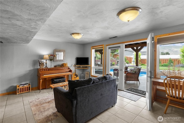418 Summer Pl SW, Mattawa, WA 99349 - living area featuring light tile patterned flooring and baseboards