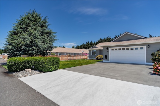 252 Mariners Dr, Sequim, WA 98382 - ranch-style home with concrete driveway and an attached garage