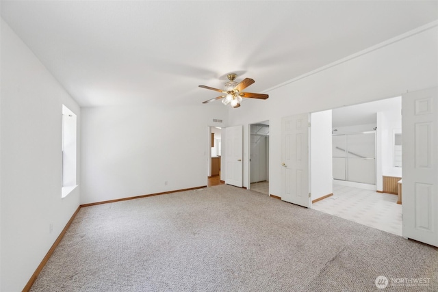824 Cherub Pl E, Port Orchard, WA 98366 - unfurnished bedroom featuring light colored carpet, baseboards, ensuite bathroom, and a walk in closet