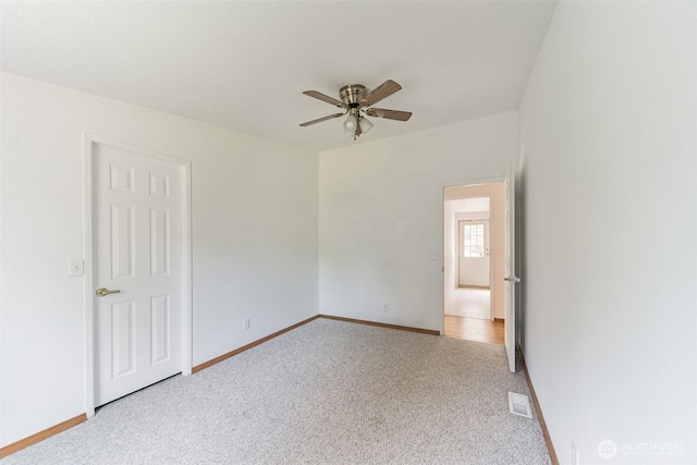 824 Cherub Pl E, Port Orchard, WA 98366 - carpeted spare room with a ceiling fan and baseboards